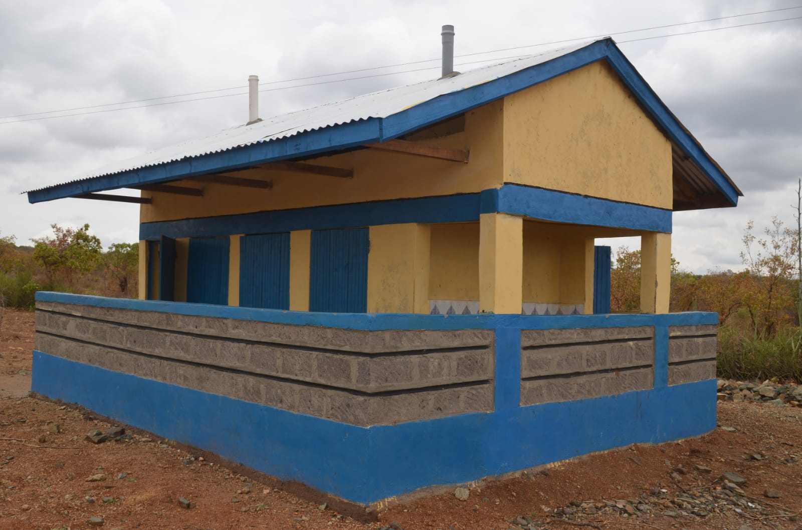 A complete 2 blocks of each 8 door pit latrines for students at AIC Ndune Day Mixed Secondary School