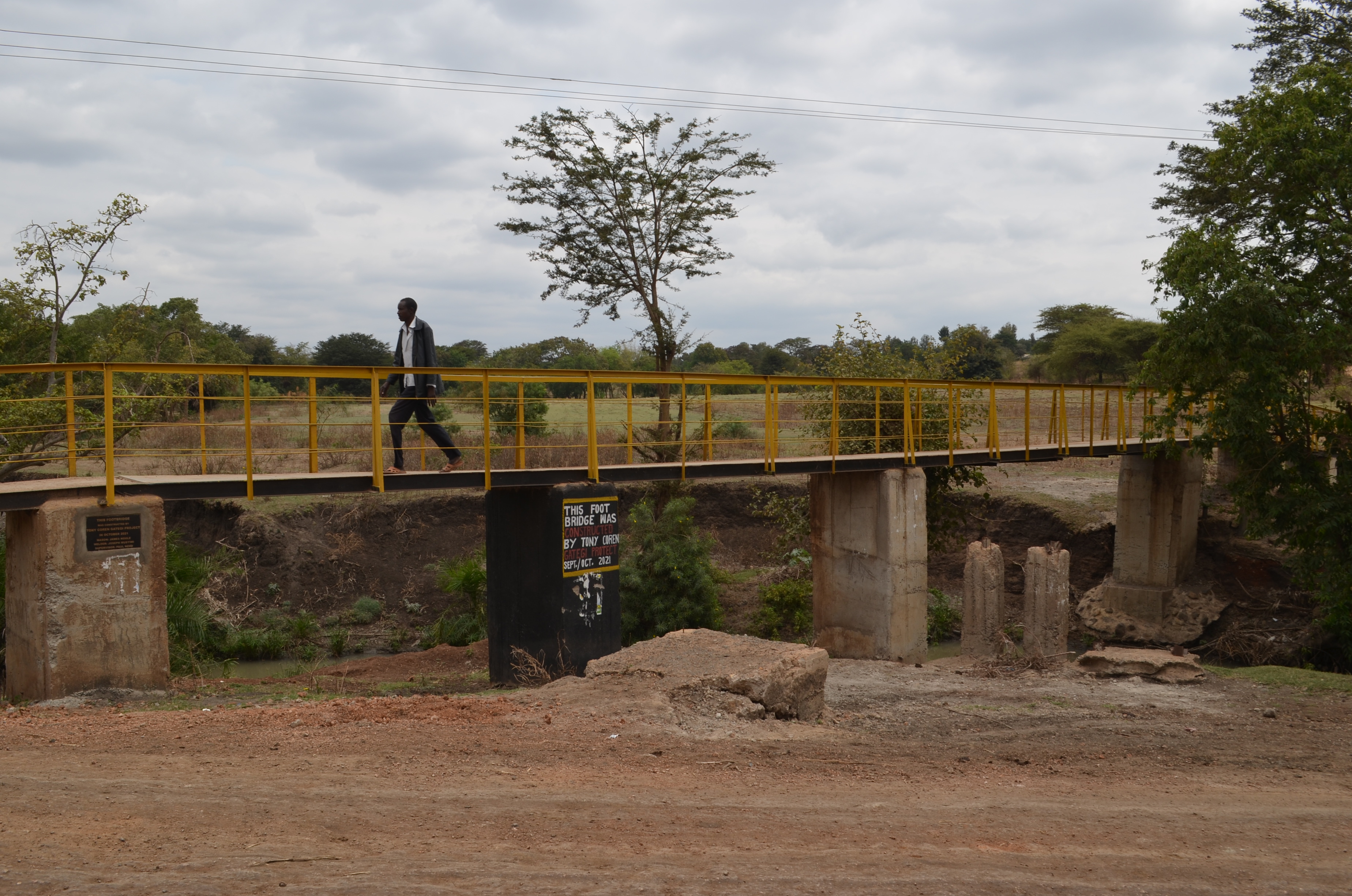 A complete foot & boda boda bridge cross Kakindu seasonal stream