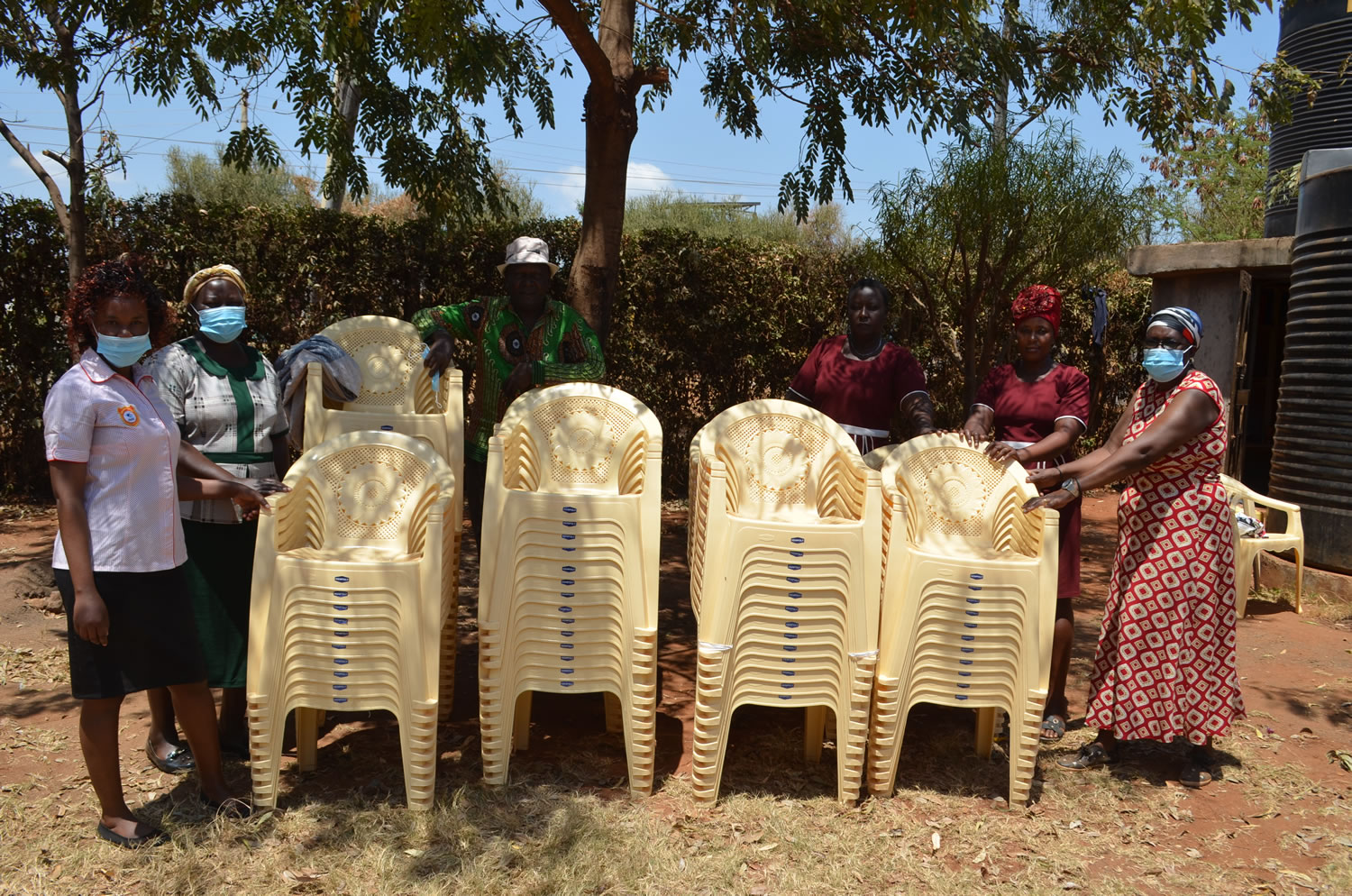 Bidii Women group receives 100 chairs from the project management board