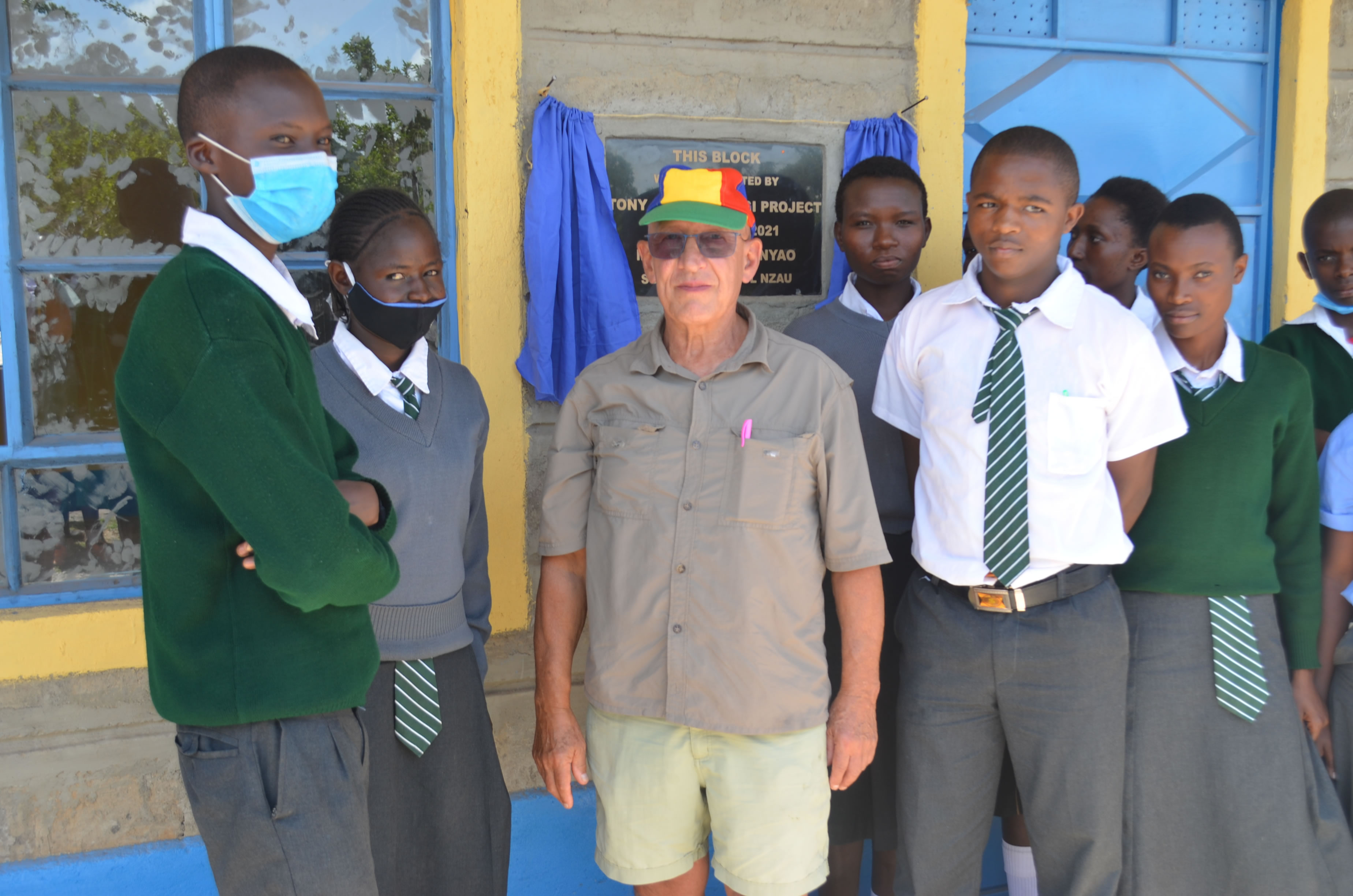  Donor hands over a block of 2 classrooms at A.I.C Ndune Secondary School